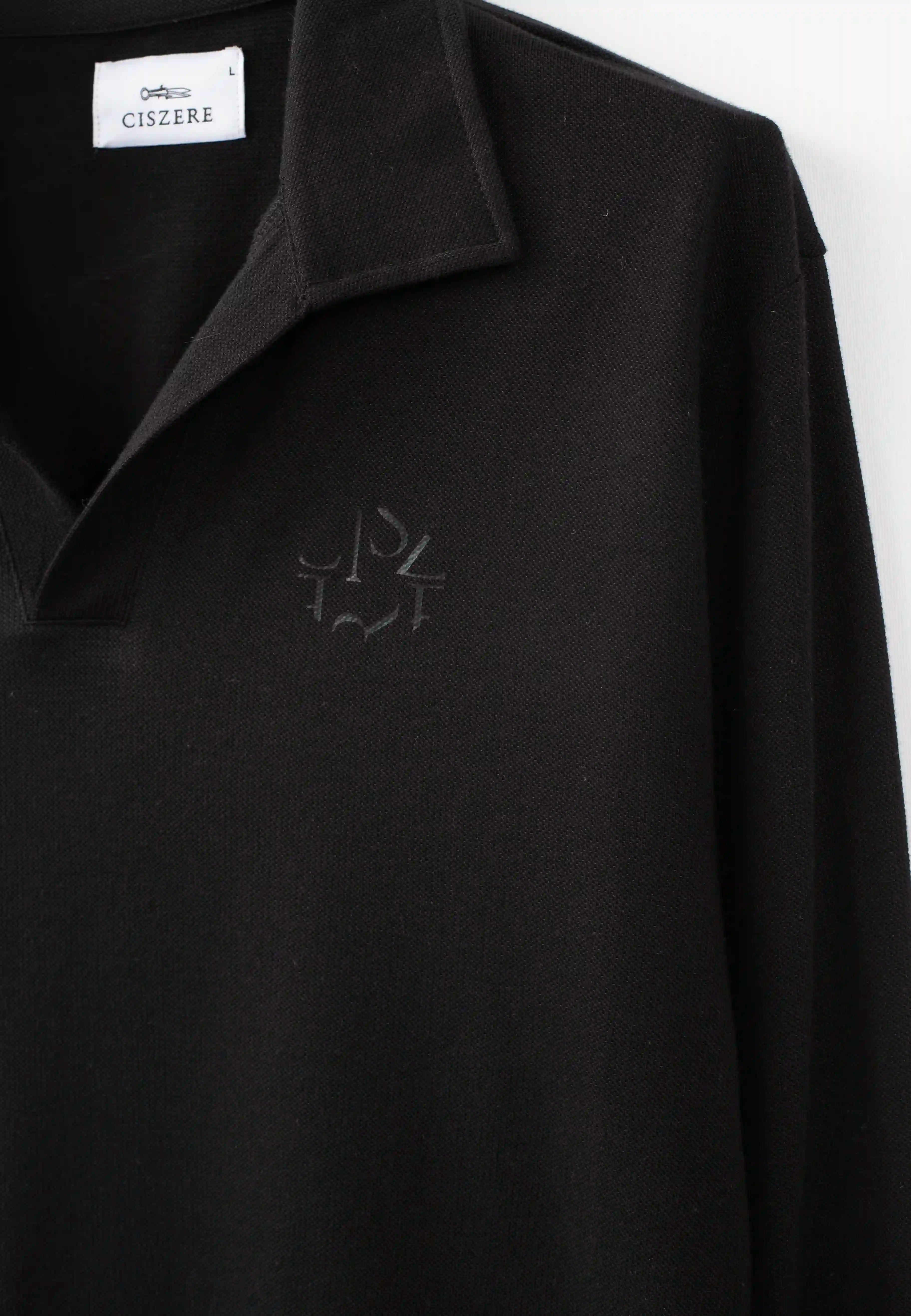 Ellipse: pique front emblem – Black