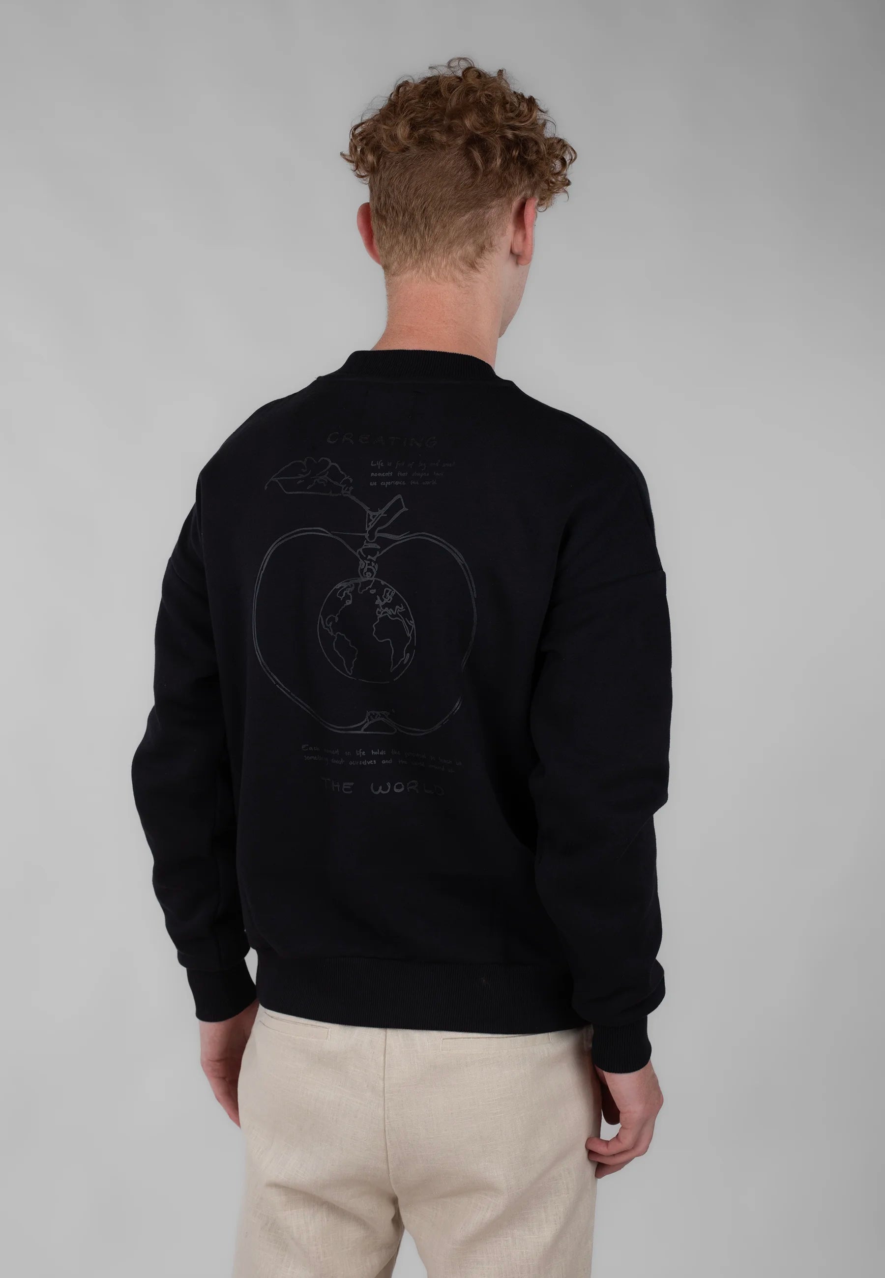 Ellipse: The world sweater – Black
