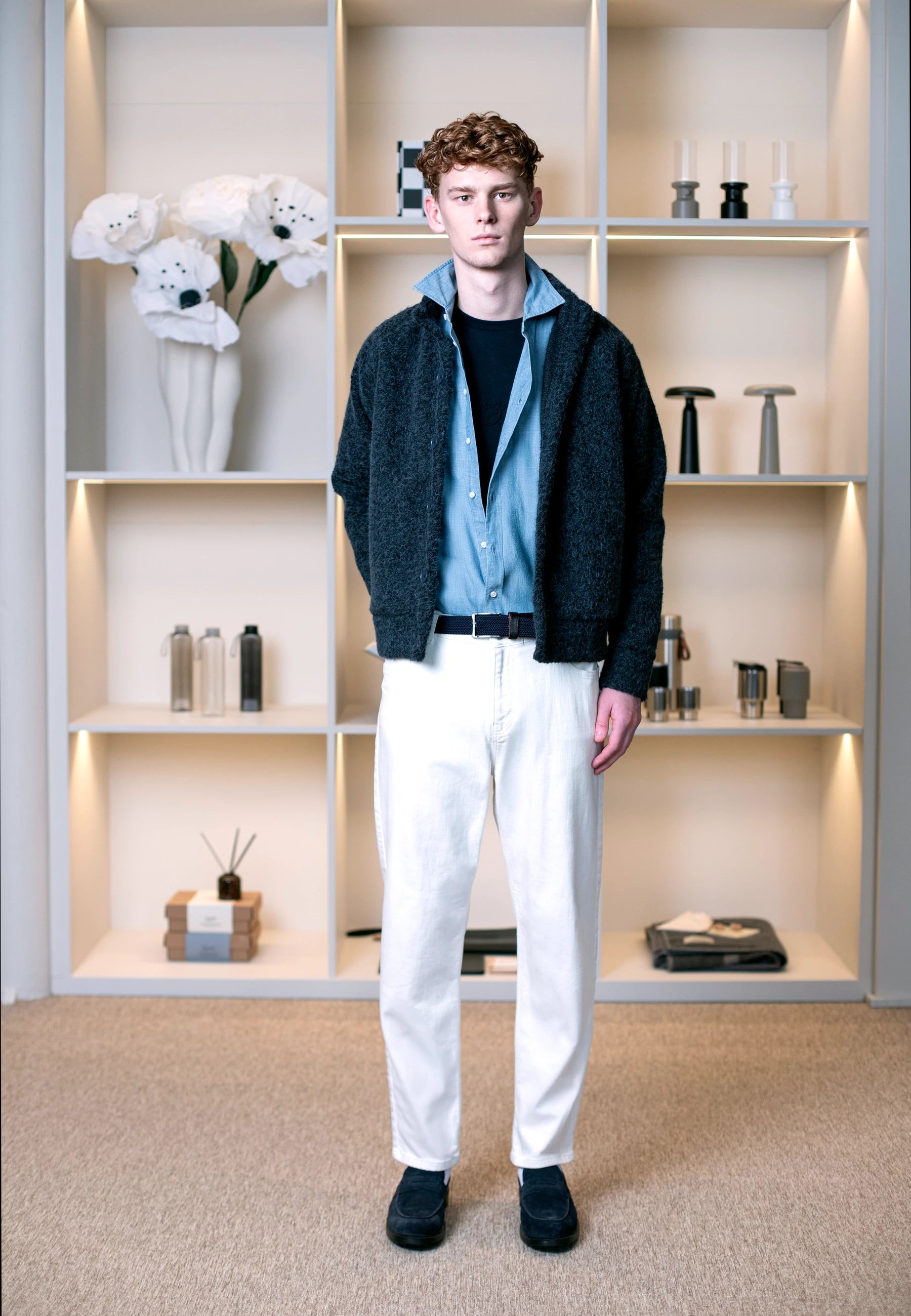 Ciszere AW26 Past Forward - dark jacket with teal knit and white trousers