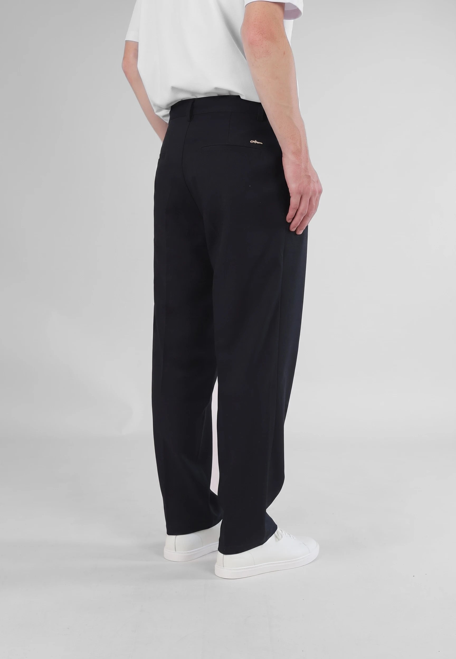 Ethan Heavy Relaxed Fit trousers - Deep navy, back view on model