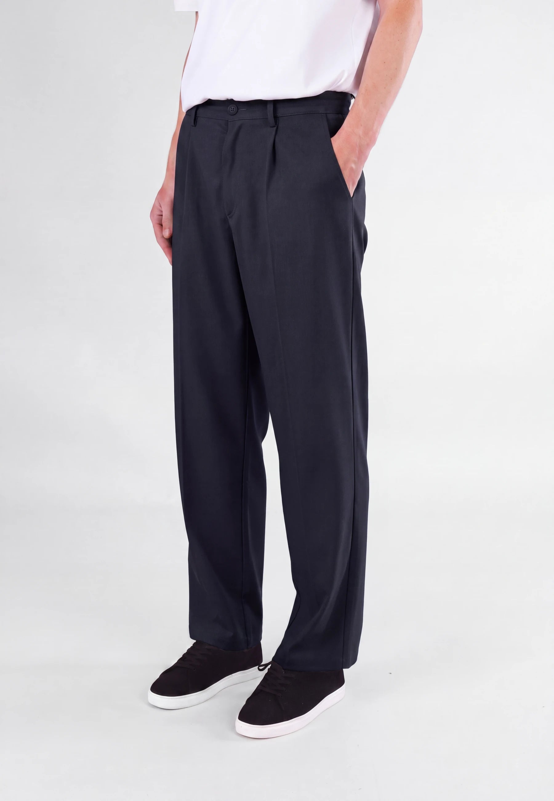 Ethan Heavy Relaxed Fit trousers - Deep navy, side view on model