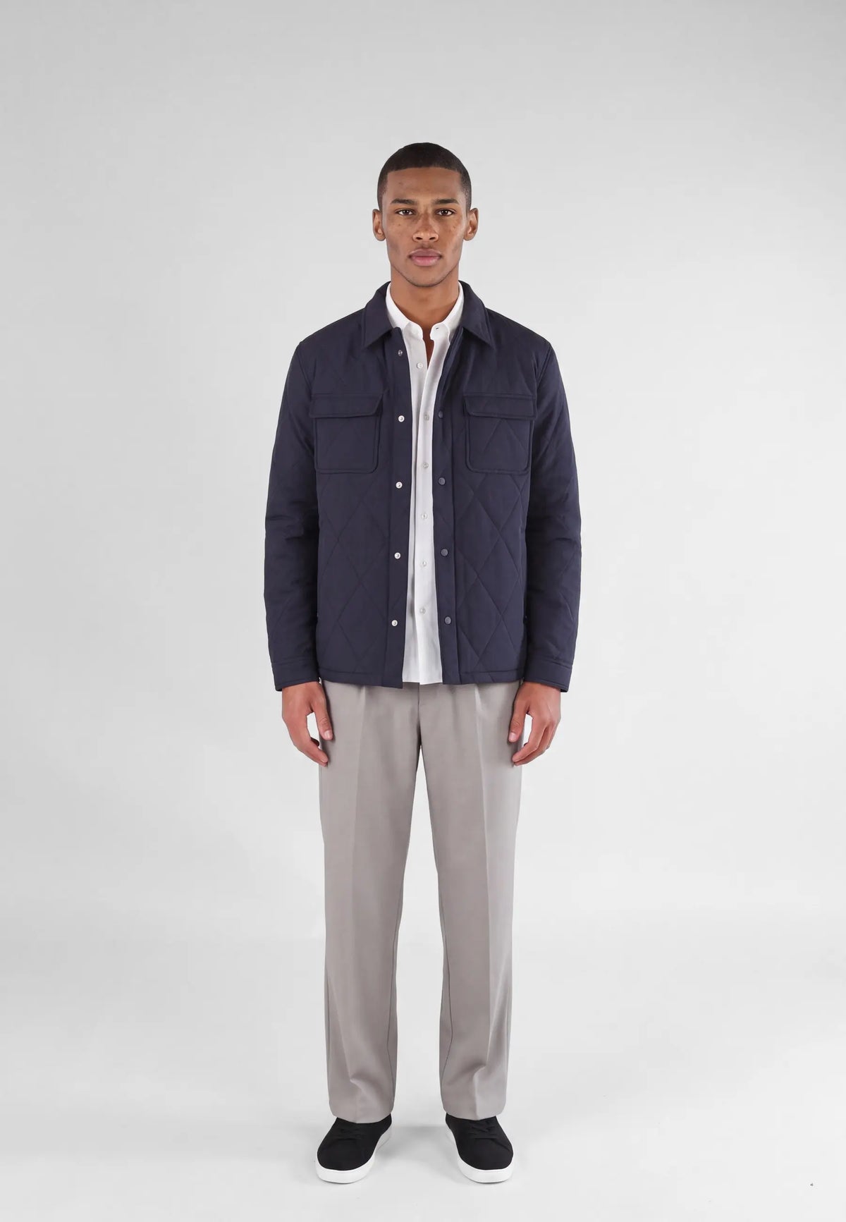Jeff quilted shirt jacket - Navy, front view on model