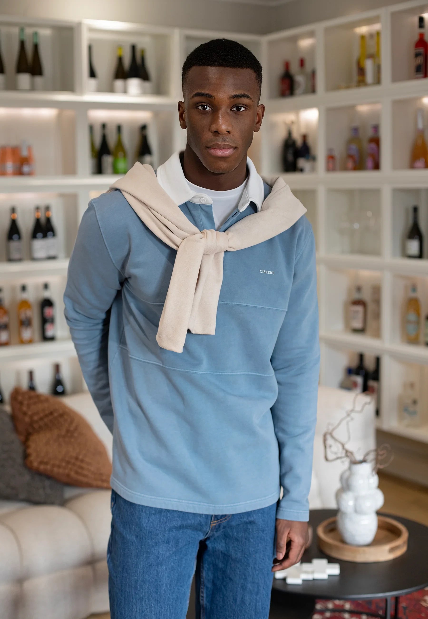 Ciszere editorial - light blue sweatshirt with knit over the shoulders