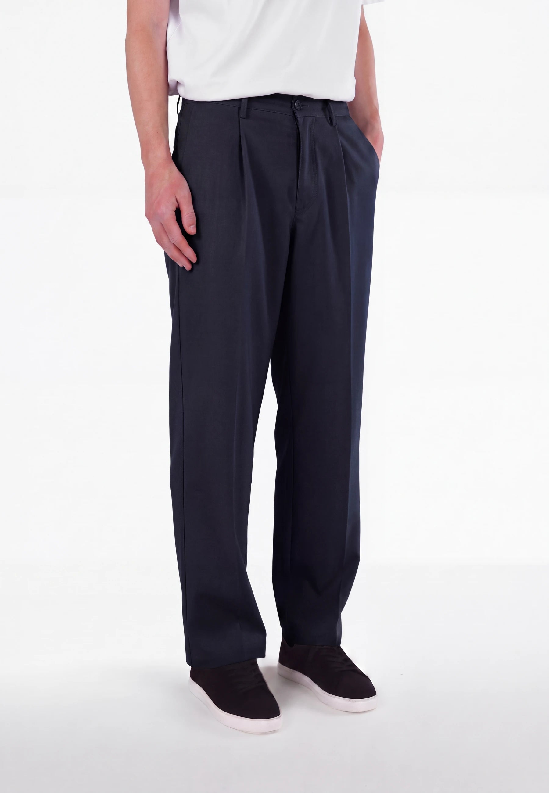 Ethan Heavy Relaxed Fit trousers - Deep navy, side view on model